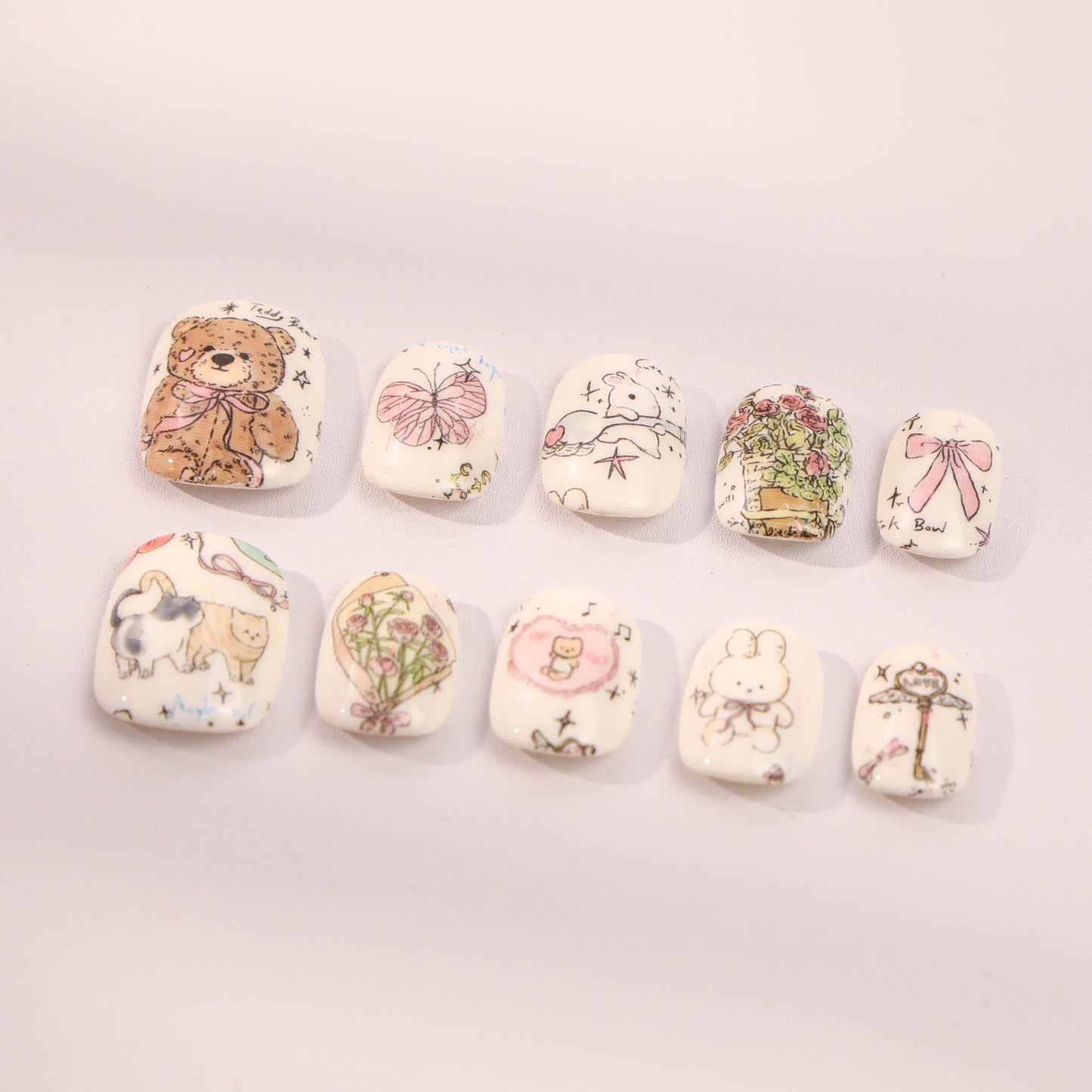 Hand-Painted Kawaii Press-On Nails with Adorable Charm.