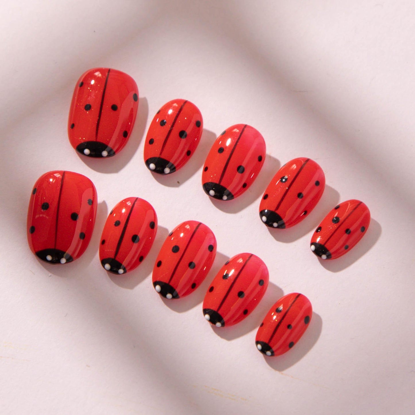 Hand-Painted Nails Featuring Whimsical Garden Art.