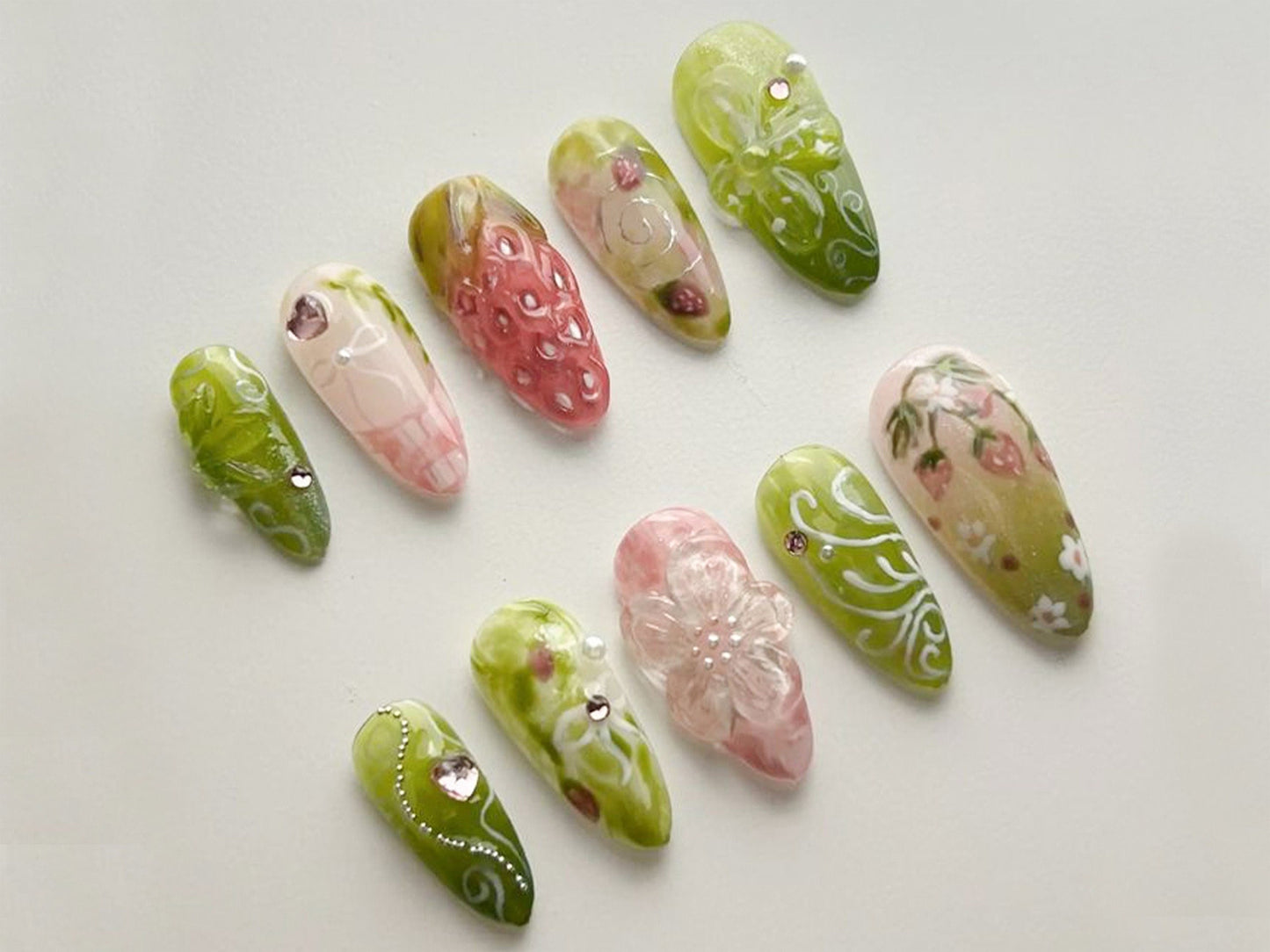 Dreamy Strawberry Garden Nails with Floral Charm.