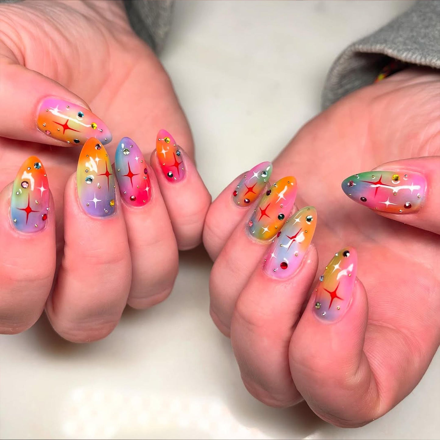 Rainbow Sparkle Press-On Nails with Dazzling Charm.