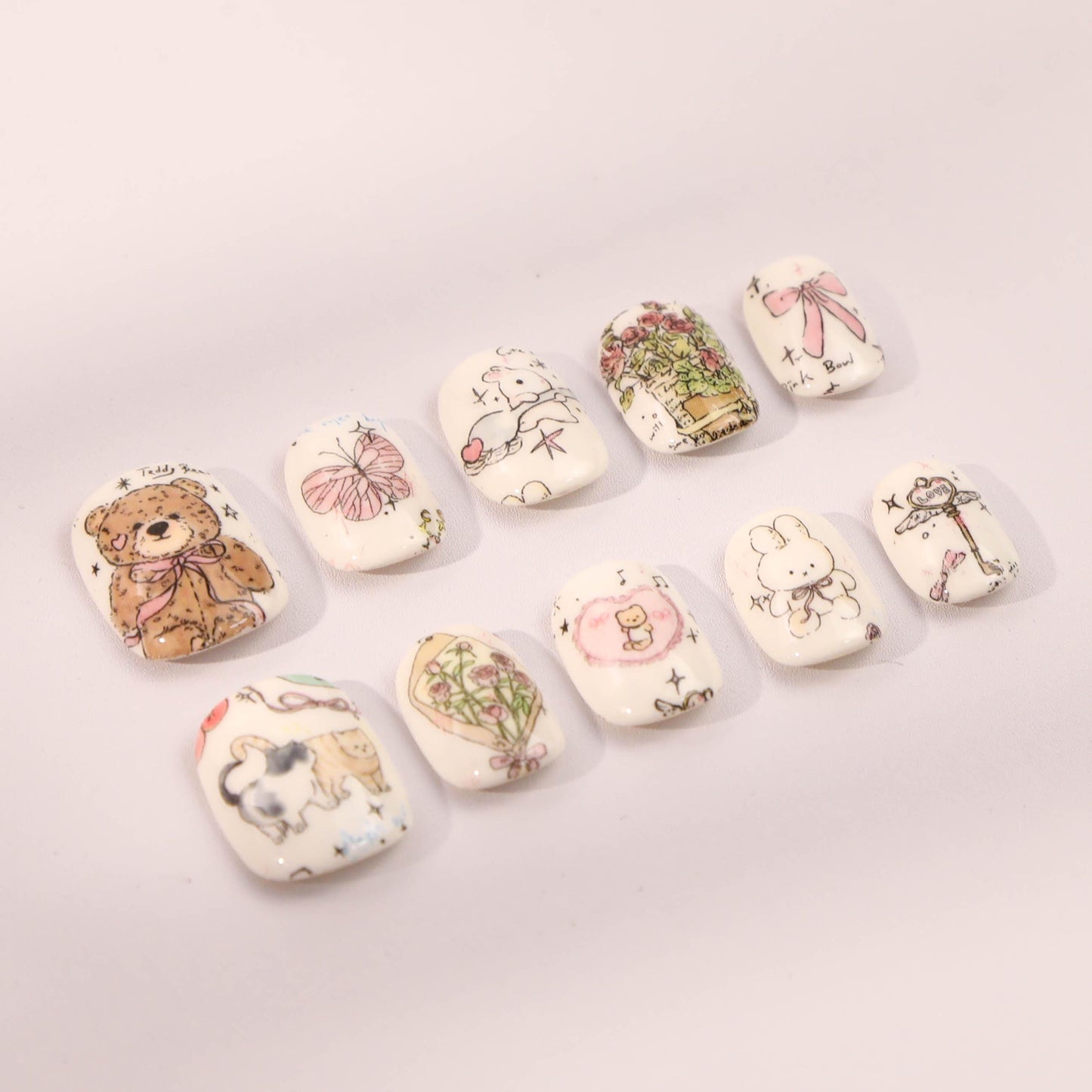Hand-Painted Kawaii Press-On Nails with Adorable Charm.