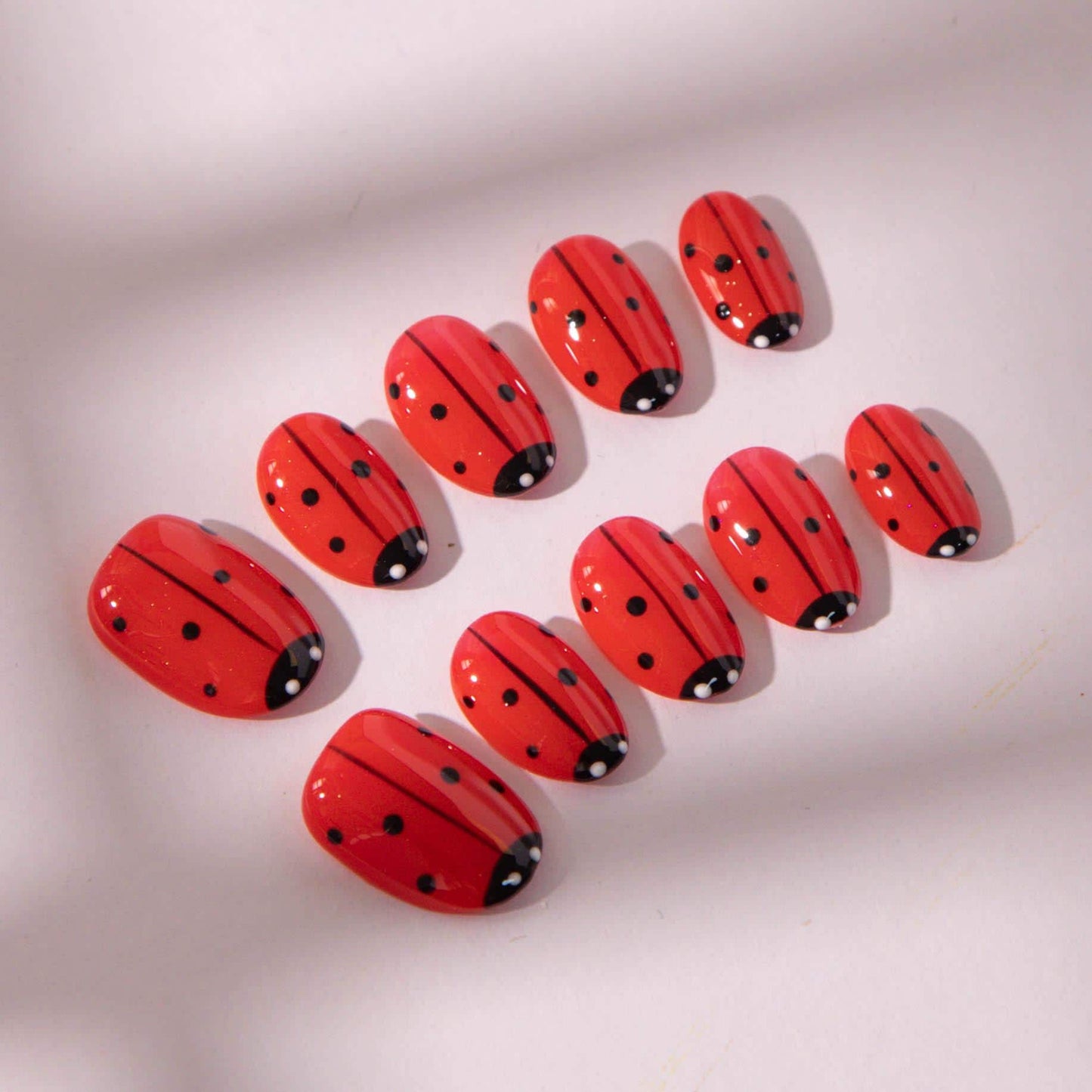Hand-Painted Nails Featuring Whimsical Garden Art.