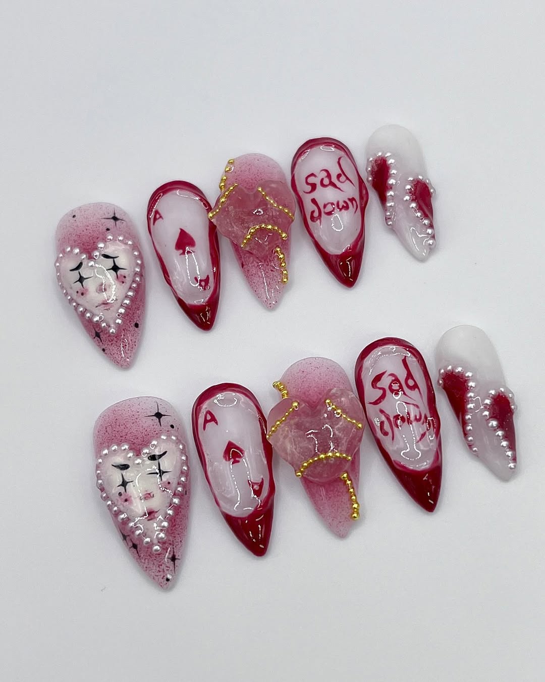 Handmade Red and White Press-On Nails with Artistic Heart Design