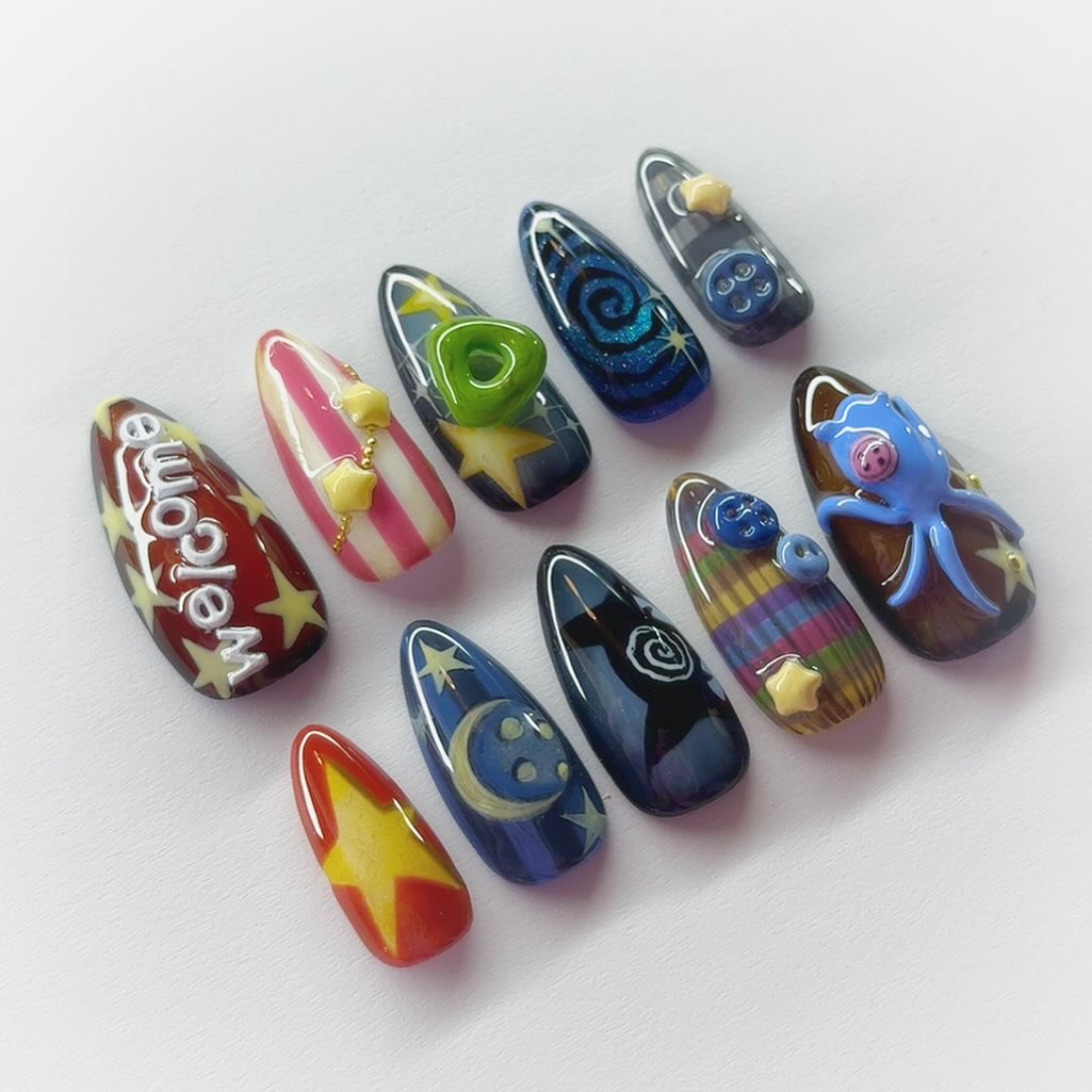 Whimsical Galaxy Press-On Nails with Stars, Stripes, and 3D Charms