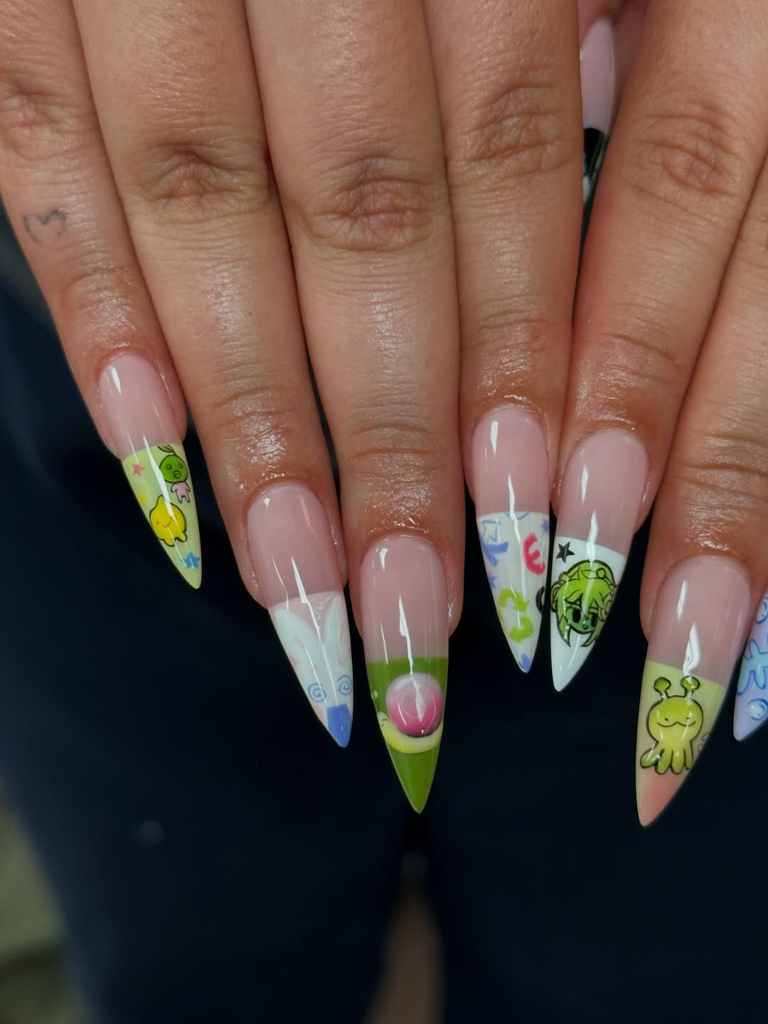 Handmade Press-On Nails with Cute Cartoon Characters and Playful Art