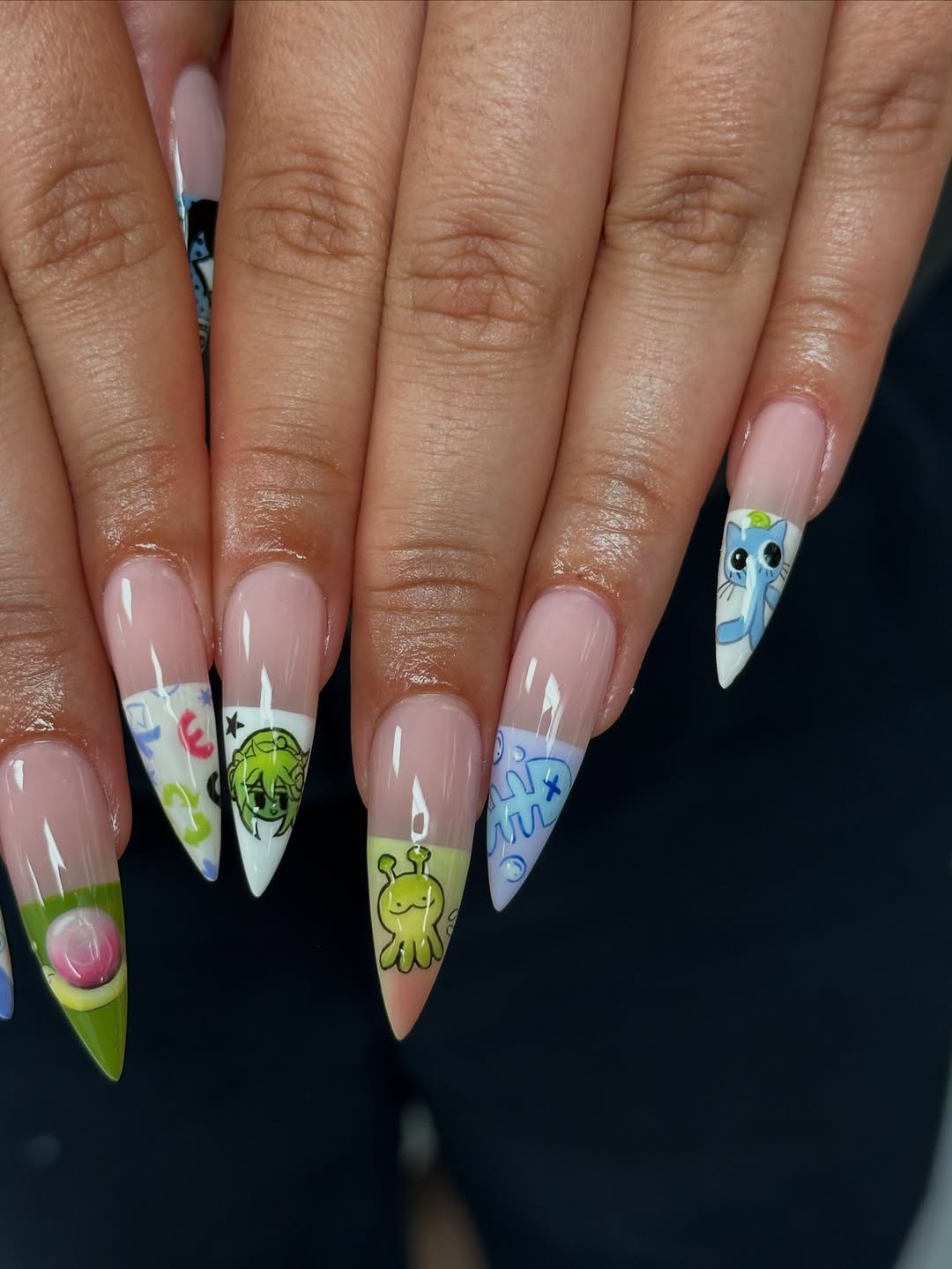 Handmade Press-On Nails with Cute Cartoon Characters and Playful Art