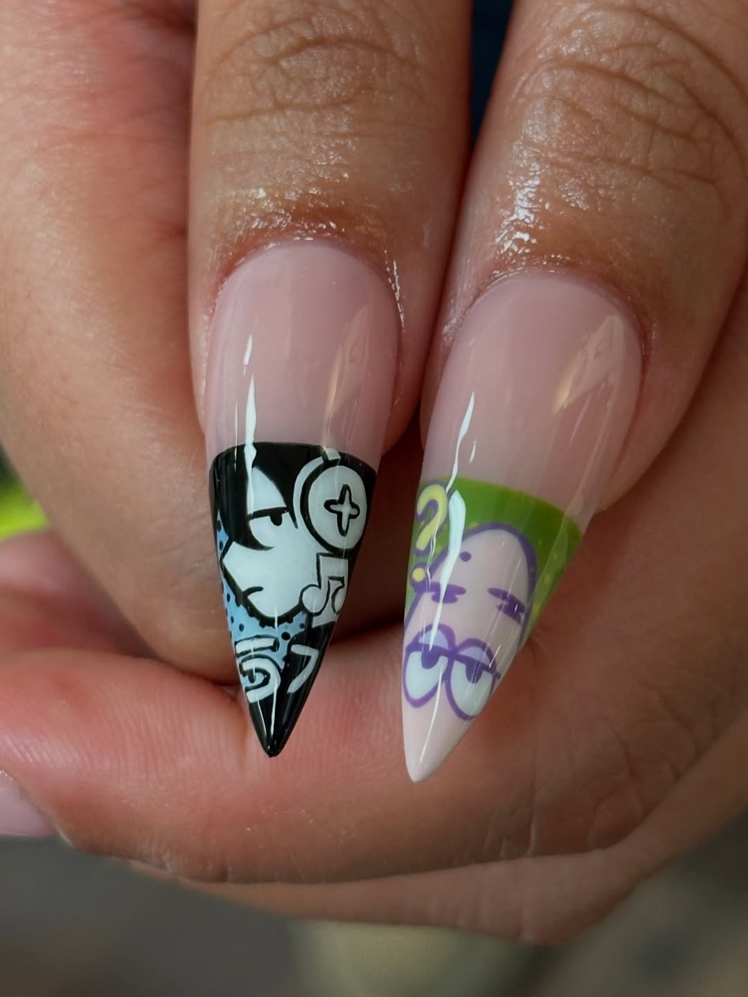 Handmade Press-On Nails with Cute Cartoon Characters and Playful Art