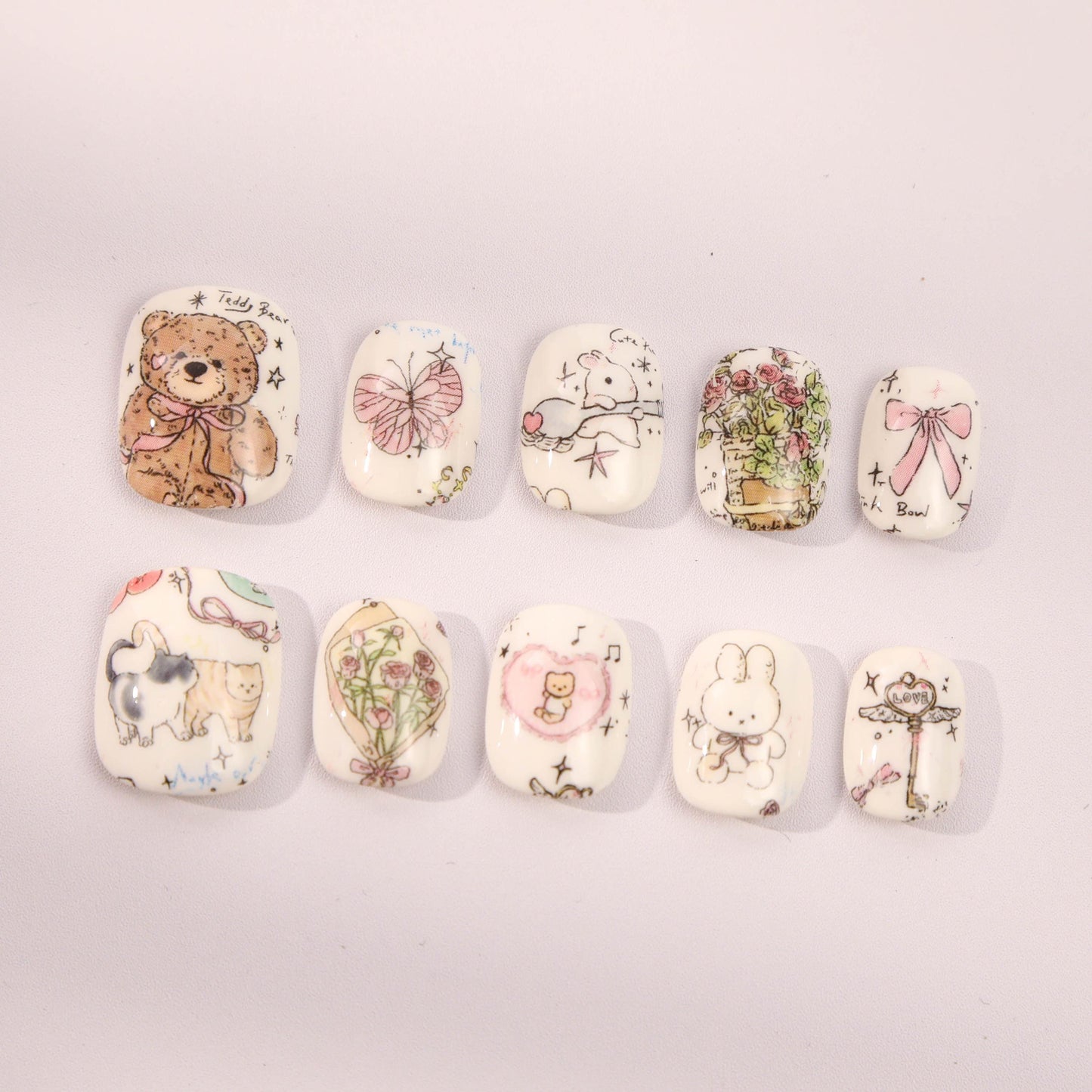 Hand-Painted Kawaii Press-On Nails with Adorable Charm.
