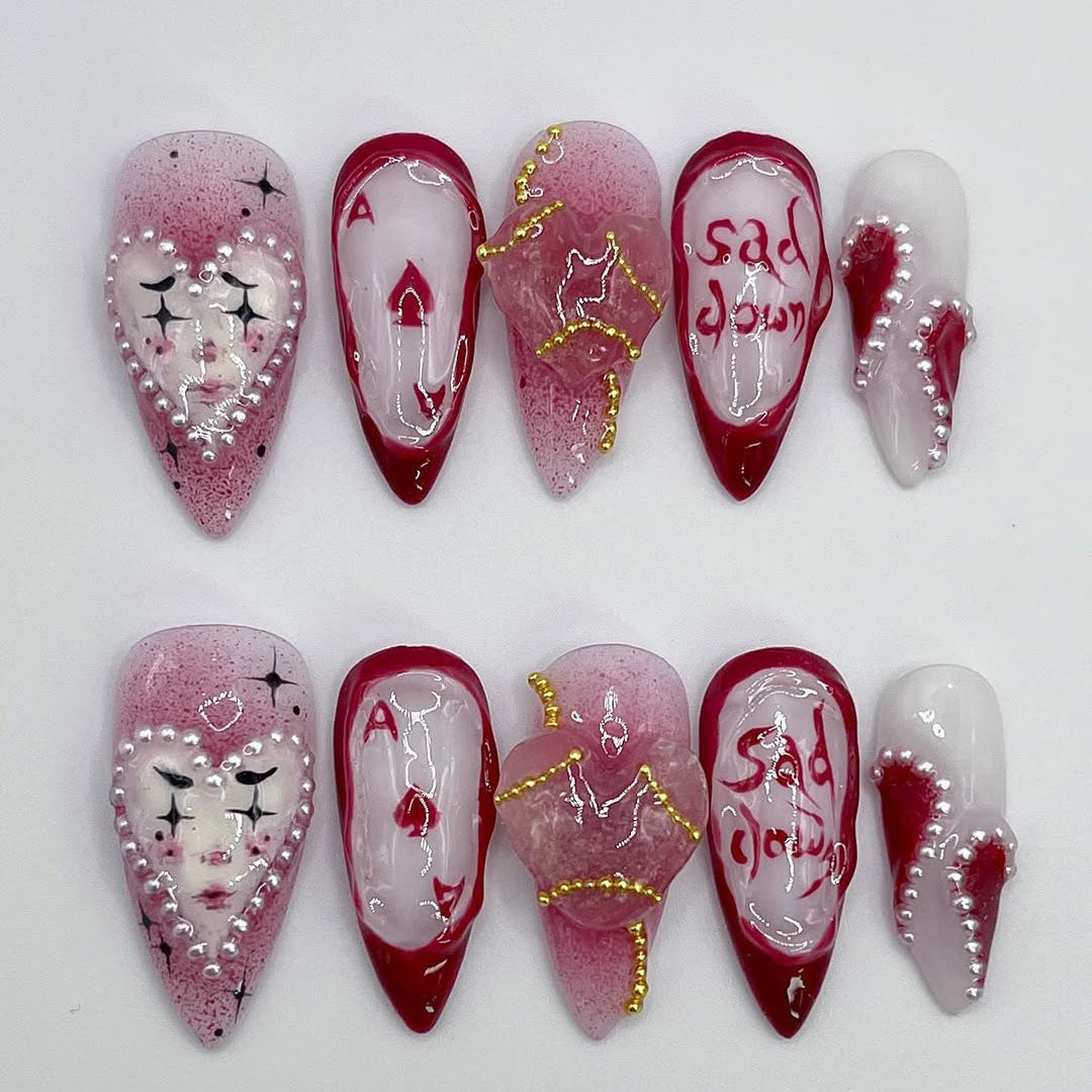 Handmade Red and White Press-On Nails with Artistic Heart Design