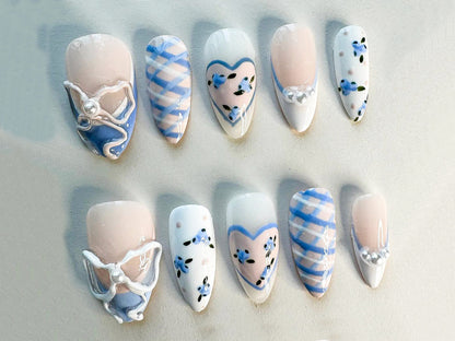 Dreamy Coquette Style Nails with Hearts and Pearls.