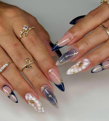 Stylish Almond Nails with Gold Accents - Trendy Manicure