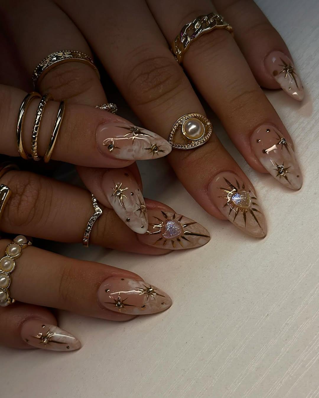 Celestial Star Nail Art with Pearl Gold Rings