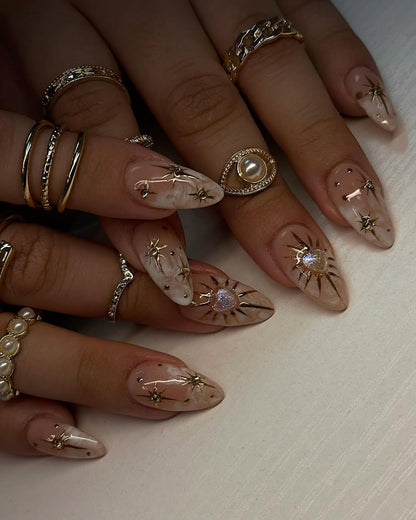 Celestial Star Nail Art with Pearl Gold Rings