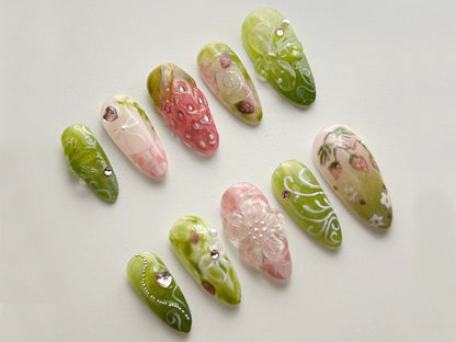 Dreamy Strawberry Garden Nails with Floral Charm.