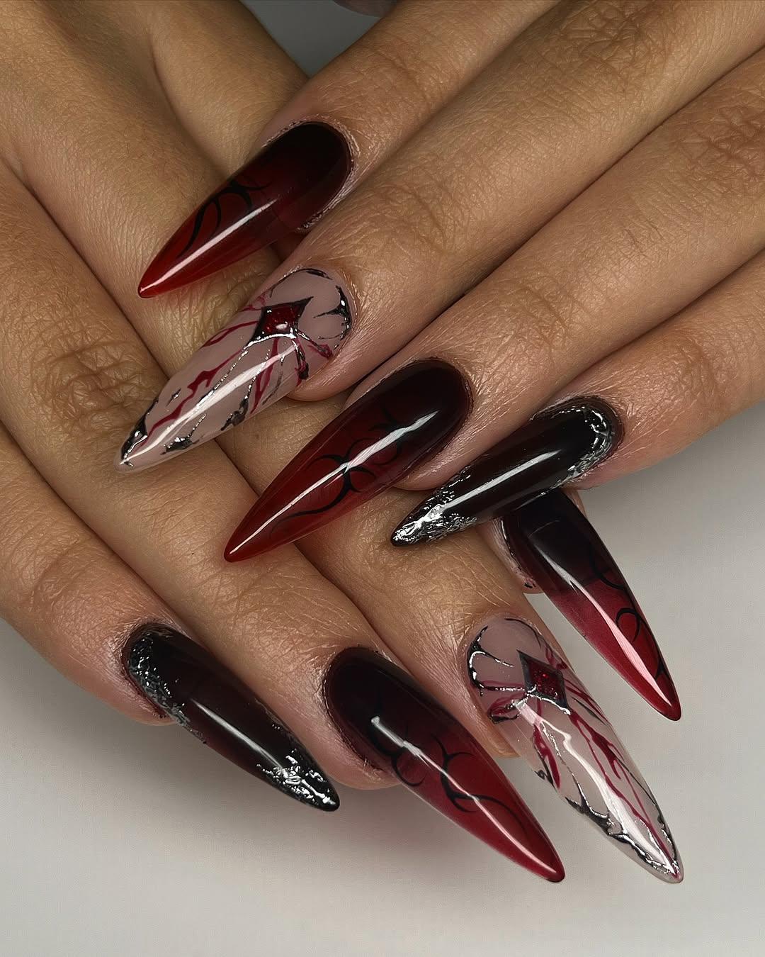 Stunning Red Ombre Stiletto Nails with Silver Accents