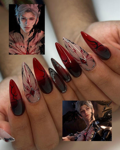 Stunning Red Ombre Stiletto Nails with Silver Accents