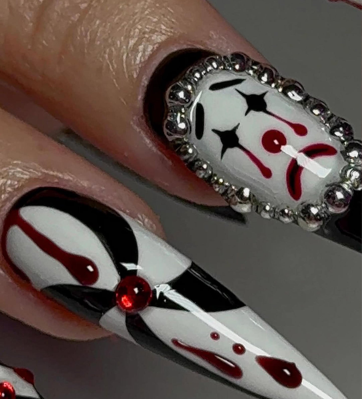 Harlequin Gothic Press-On Nails with Clown Face and Blood Drip Design