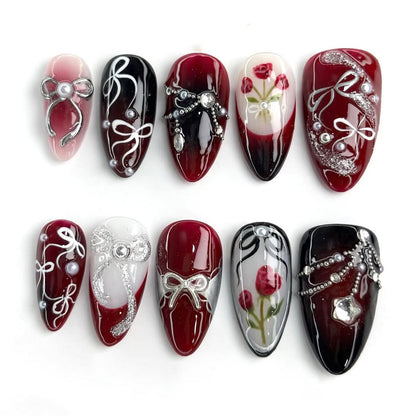 Deep Red Rose Nails with Silver Ribbon and Pearl Detailing Handmade Luxury Design