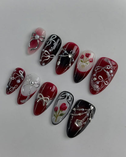 Deep Red Rose Nails with Silver Ribbon and Pearl Detailing Handmade Luxury Design