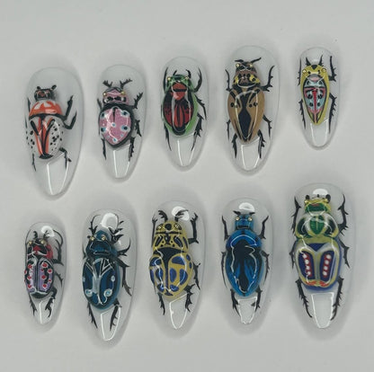 Colorful Insect Press On Nails with Artistic Beetle Hand Painting