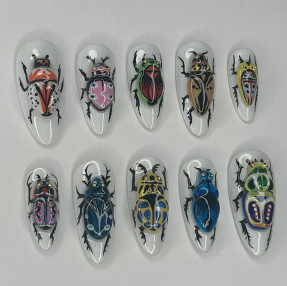 Colorful Insect Press On Nails with Artistic Beetle Hand Painting