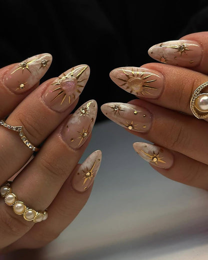 Celestial Star Nail Art with Pearl Gold Rings