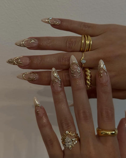 Elegant Nude Almond Press On Nails with Gold 3D Swirl Design