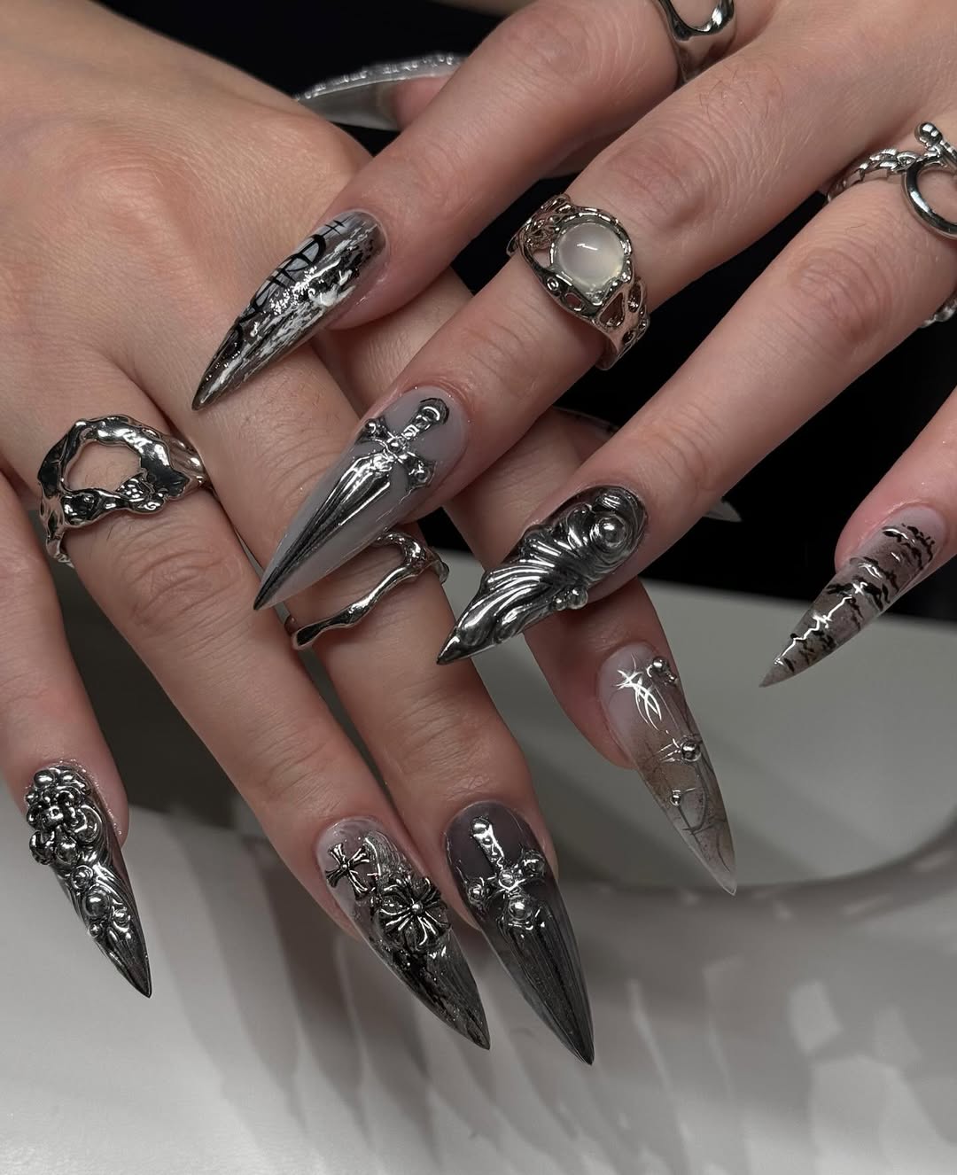 Gothic Silver Stiletto Nails with Cross and Metallic Sculpted Art