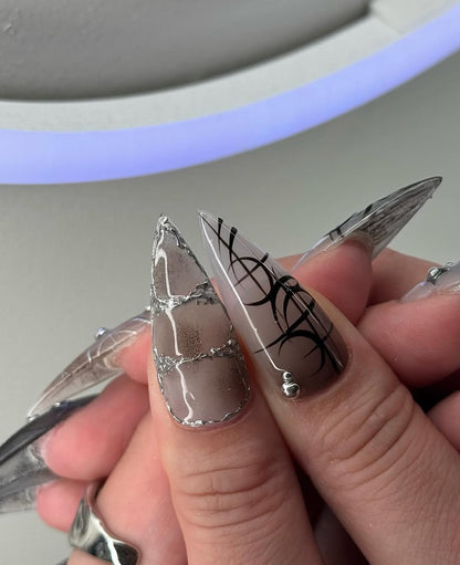 Gothic Silver Stiletto Nails with Cross and Metallic Sculpted Art