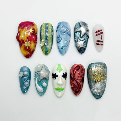 Cosmic Art Press On Nails with Metallic Stars, Face Design, and Galaxy Texture