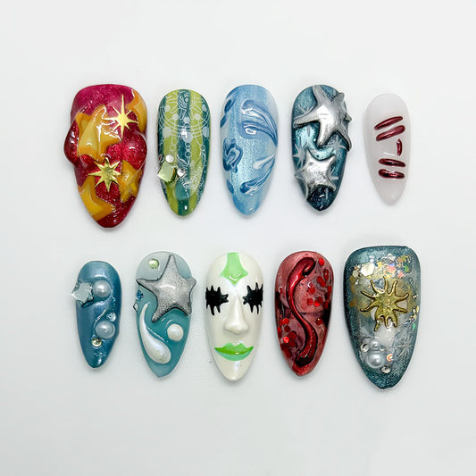 Cosmic Art Press On Nails with Metallic Stars, Face Design, and Galaxy Texture