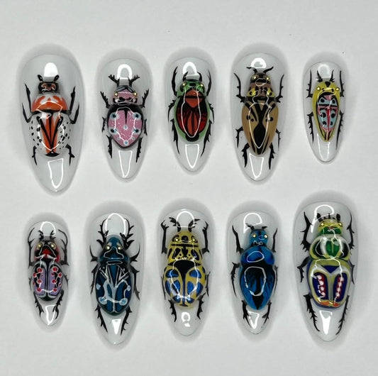 Colorful Insect Press On Nails with Artistic Beetle Hand Painting