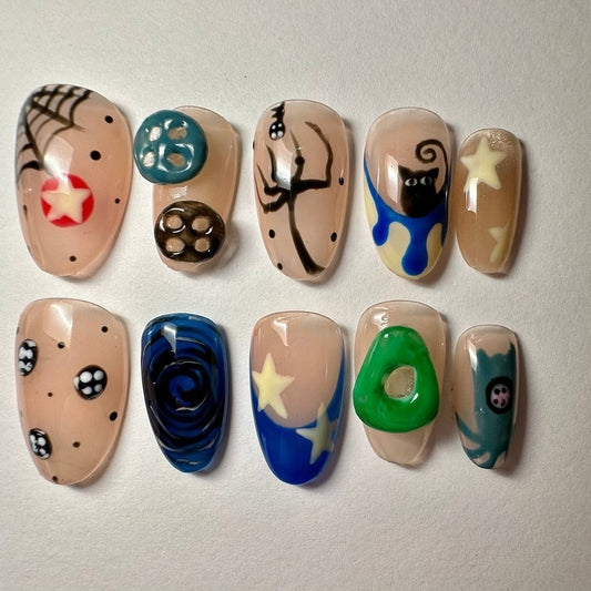 Coraline Inspired Press-On Nails with Buttons, Cat, and Starry Designs
