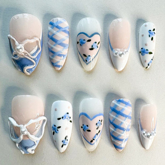 Dreamy Coquette Style Nails with Hearts and Pearls.