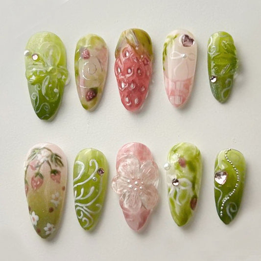 Dreamy Strawberry Garden Nails with Floral Charm.