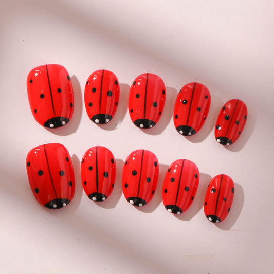 Hand-Painted Nails Featuring Whimsical Garden Art.