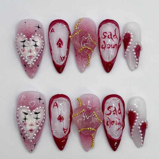 Handmade Red and White Press-On Nails with Artistic Heart Design