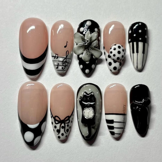 Luxury Nude and Black 3D Press-On Nails with Musical and Whimsical Accents