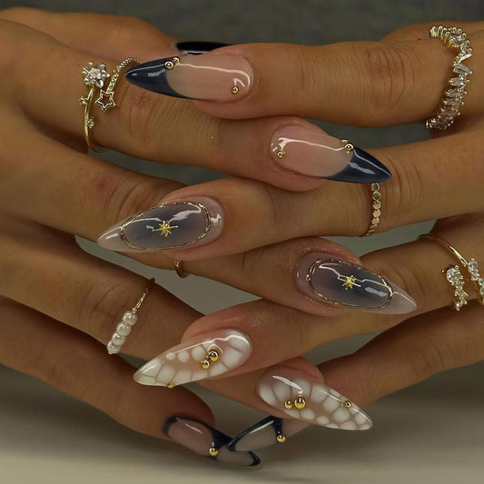 Stylish Almond Nails with Gold Accents - Trendy Manicure